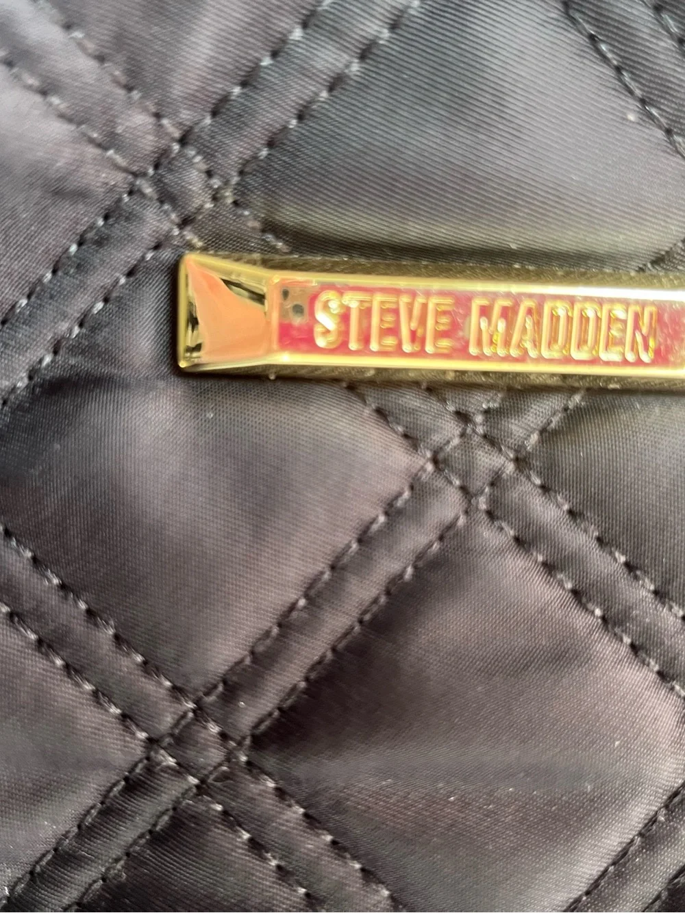 Steve Madden Quilted Black Backpack with Gold Accents